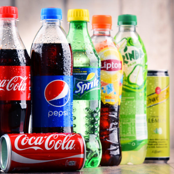 Bottles of assorted global soft drinks
